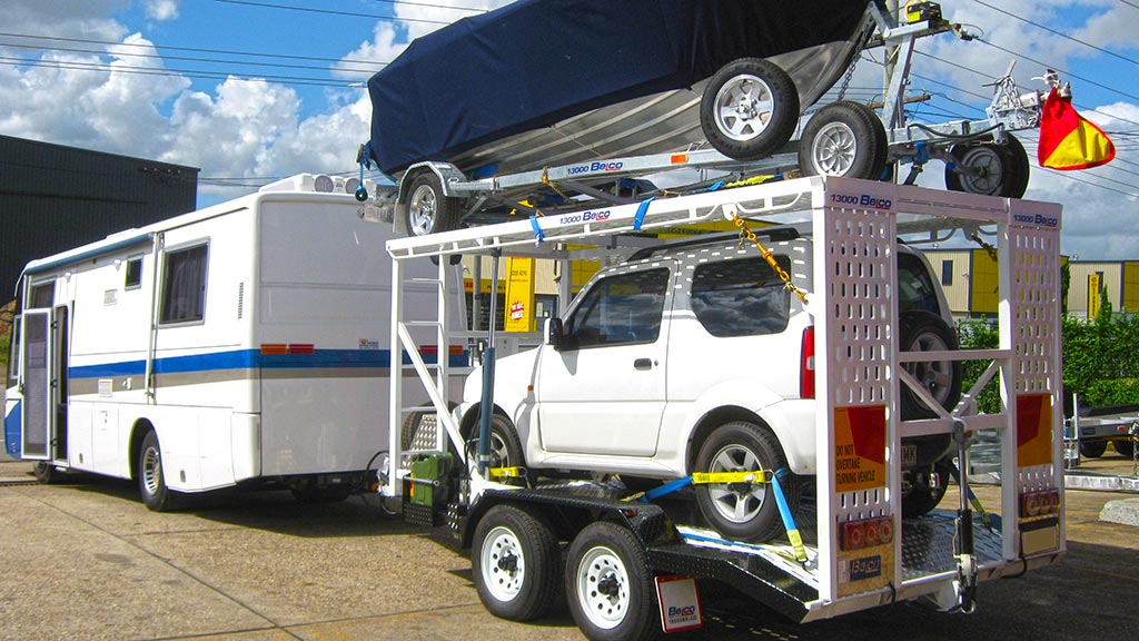 Belco custom designed car and boat trailer, loaded with a Suzuki Jimny and aluminum dingy