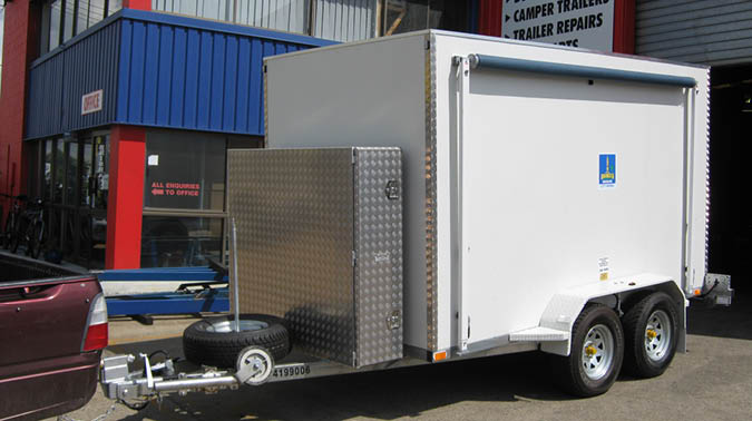 Image of a Belco-fabricated box trailer with tandem axles