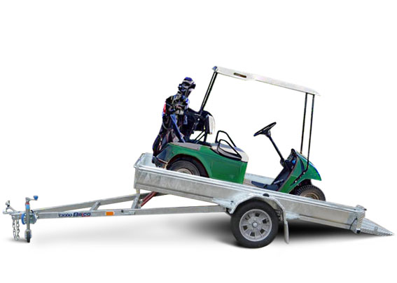A green golf cart on a Belco tilt trailer.